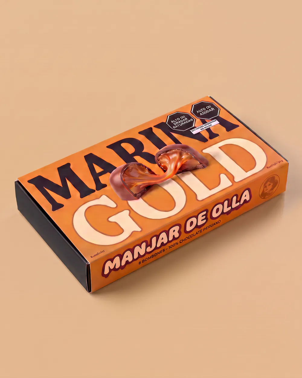 Caja Manjar de olla de Marina Gold cerrada, con su faja naranja
