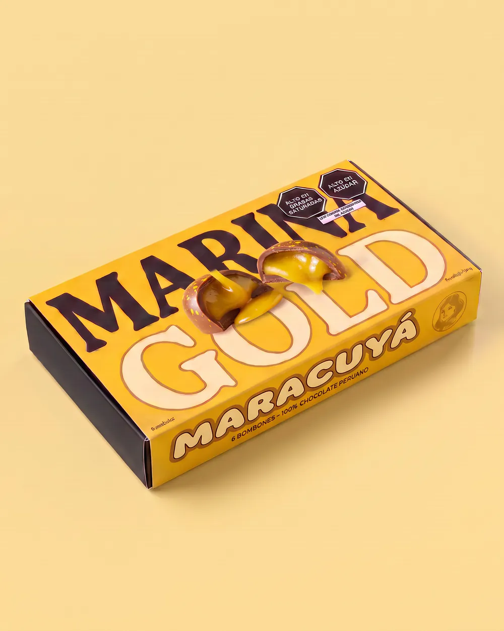 Caja Maracuyá de Marina Gold cerrada, con su faja amarilla